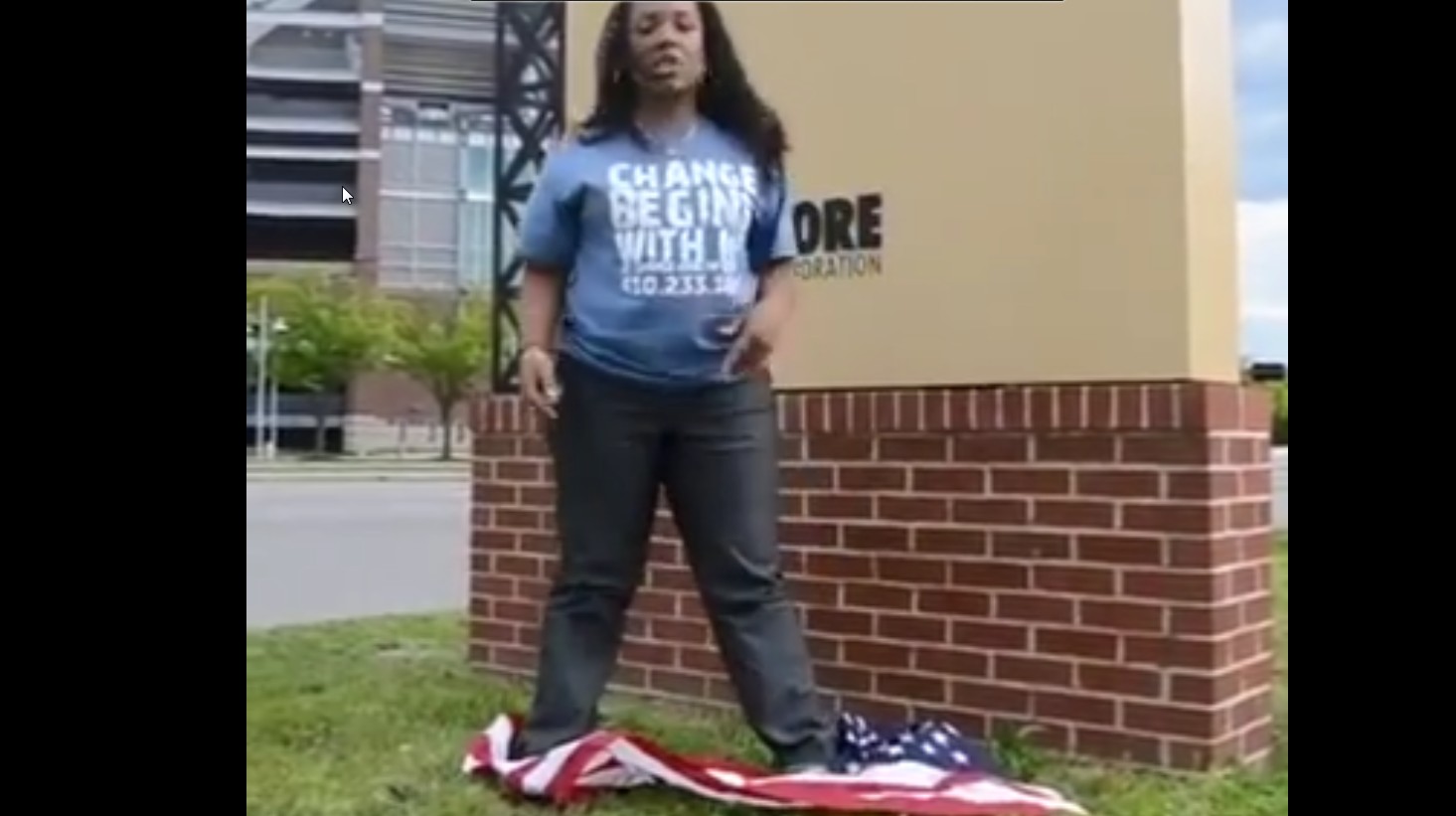 Erica Walker steps on US Flag for July 4th